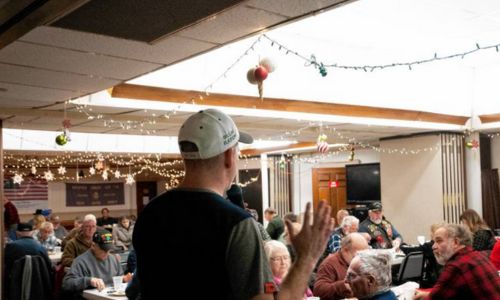 Peers honor service-minded vet